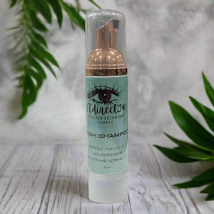 Bottle oflash shampoo on a counter with stacks of boxes in the background